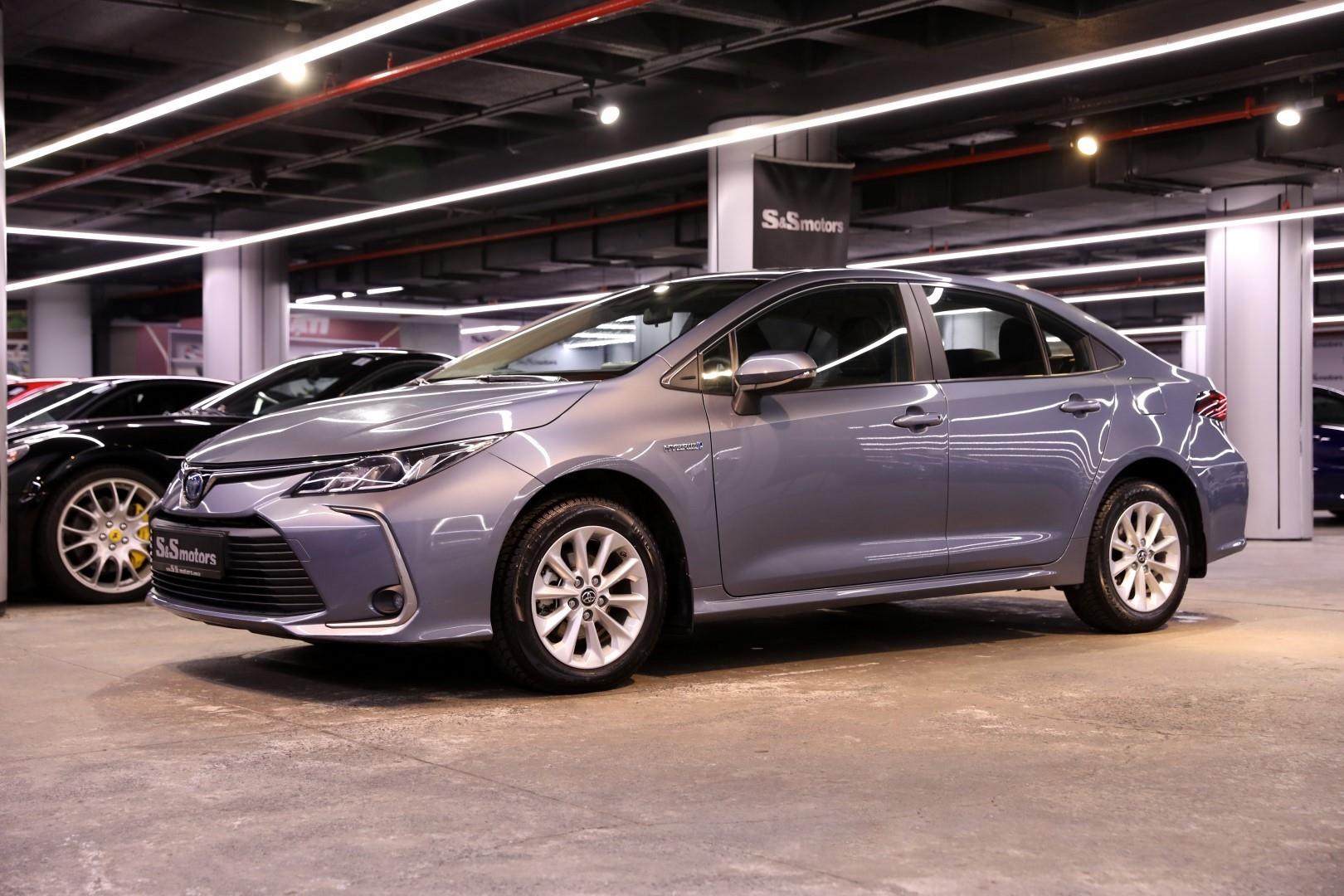 Corolla гибрид. Toyota Hybrid 2021. Toyota Corolla Hybrid 2021. Toyota Corolla 1.8 Hybrid. Тойота Королла гибрид 2022.